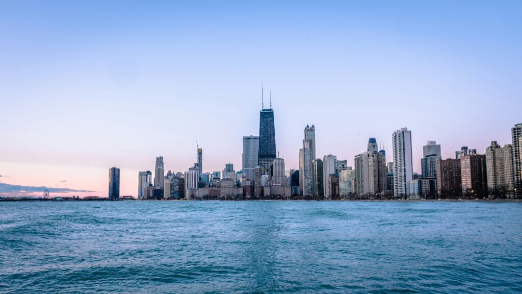 Chicago skyline at dusk with calm Lake Michigan symbolizing hope and tranquility for adults seeking anxiety therapy in Chicago